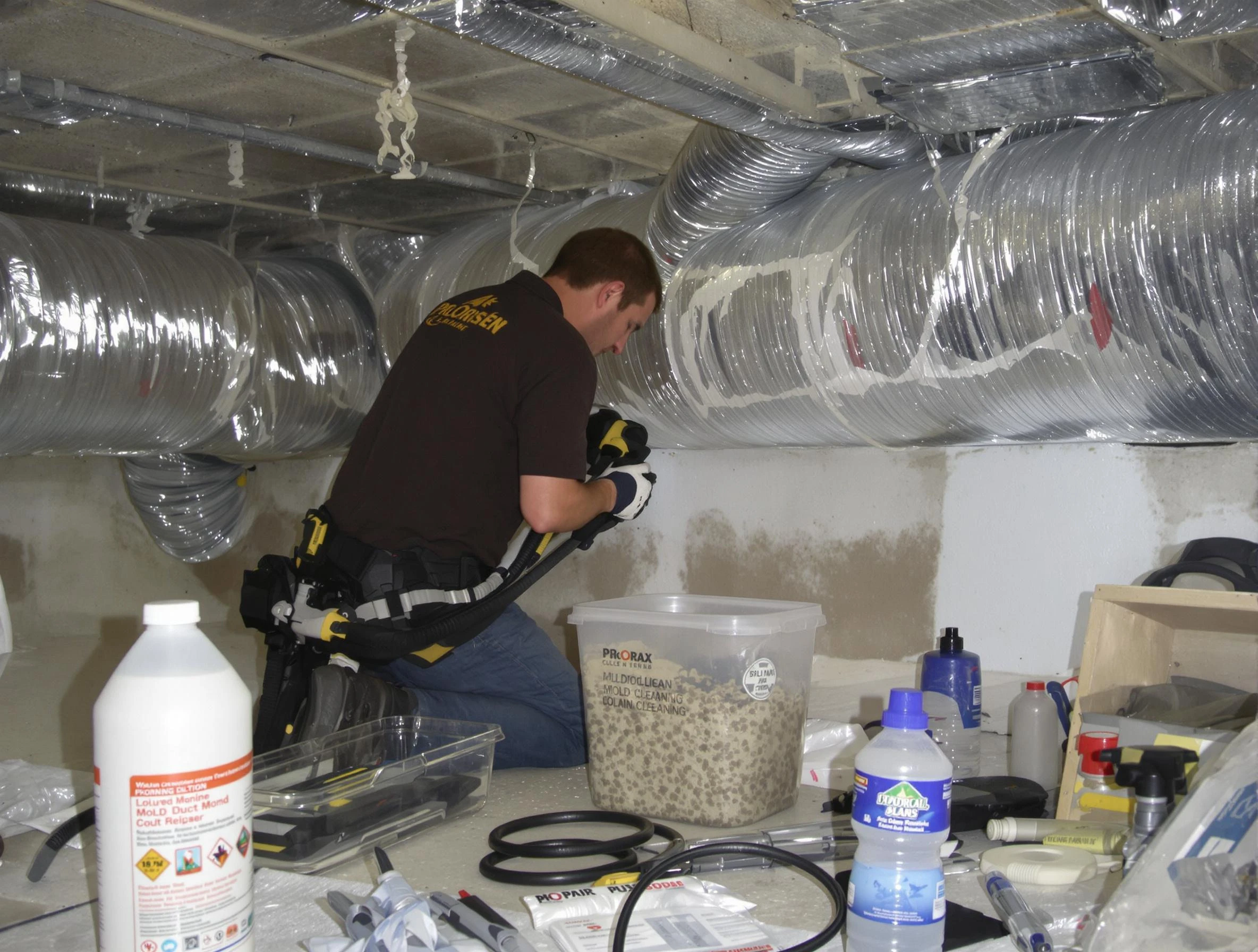 Castle Pines Village Air Duct Cleaning specialist performing professional mold removal from air ducts in Castle Pines Village